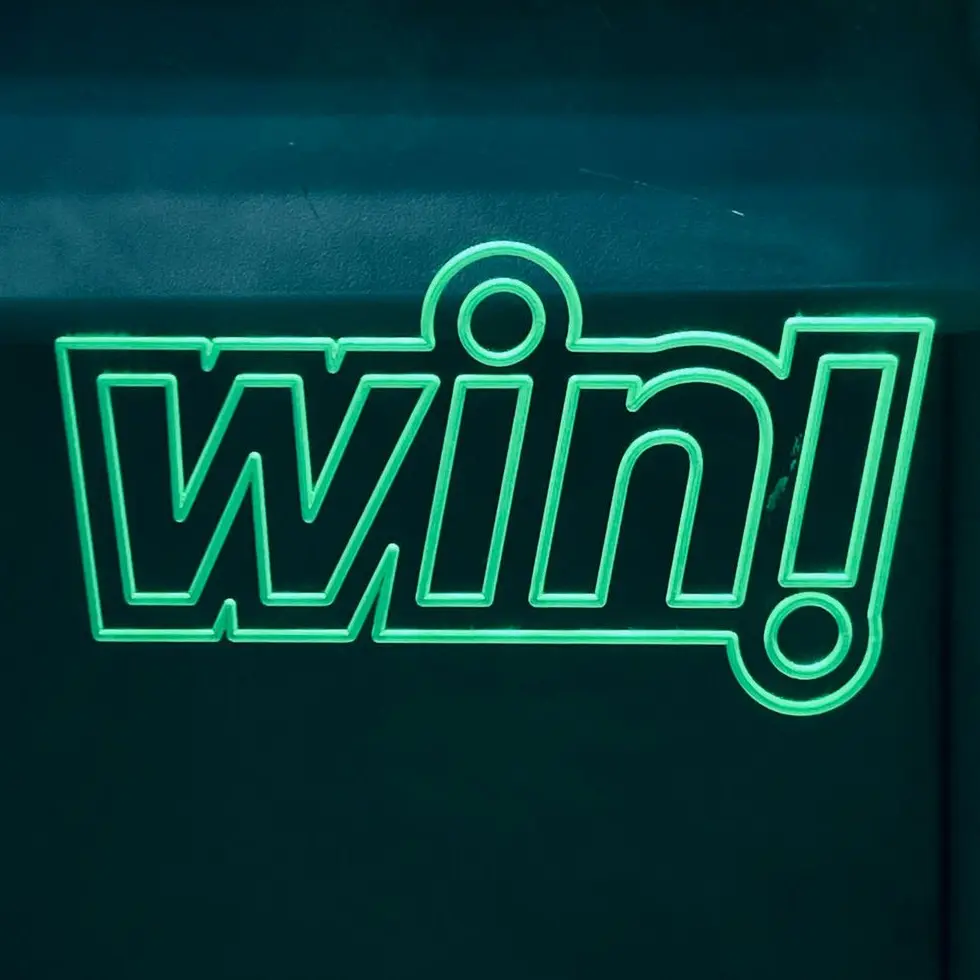 a neon sign with the word win on it